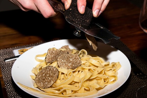 How do you cook with truffles for an exquisite flavor?